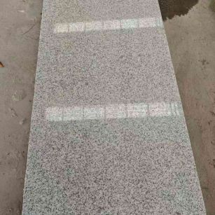 资阳芝麻白光面毛板